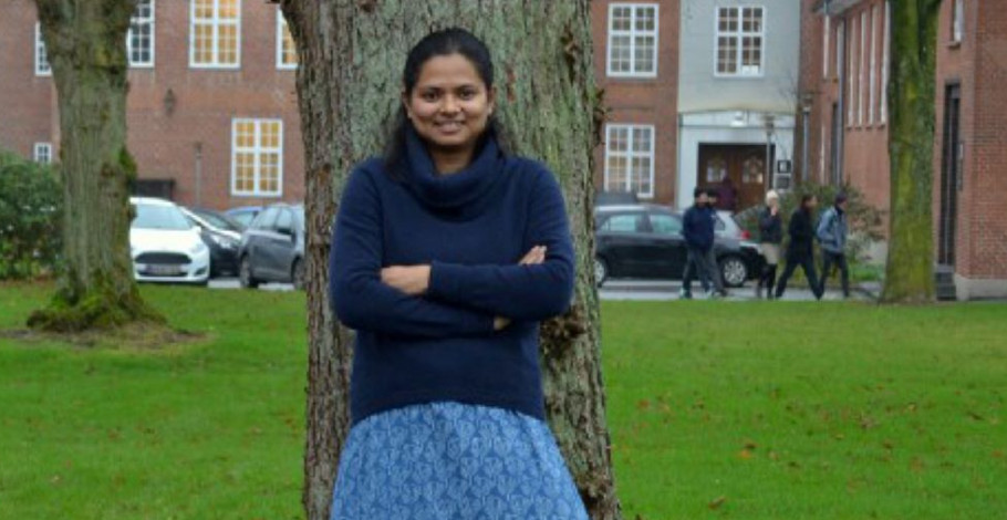 Photo of Priya by Lisbeth Burich Priya standing outside smiling